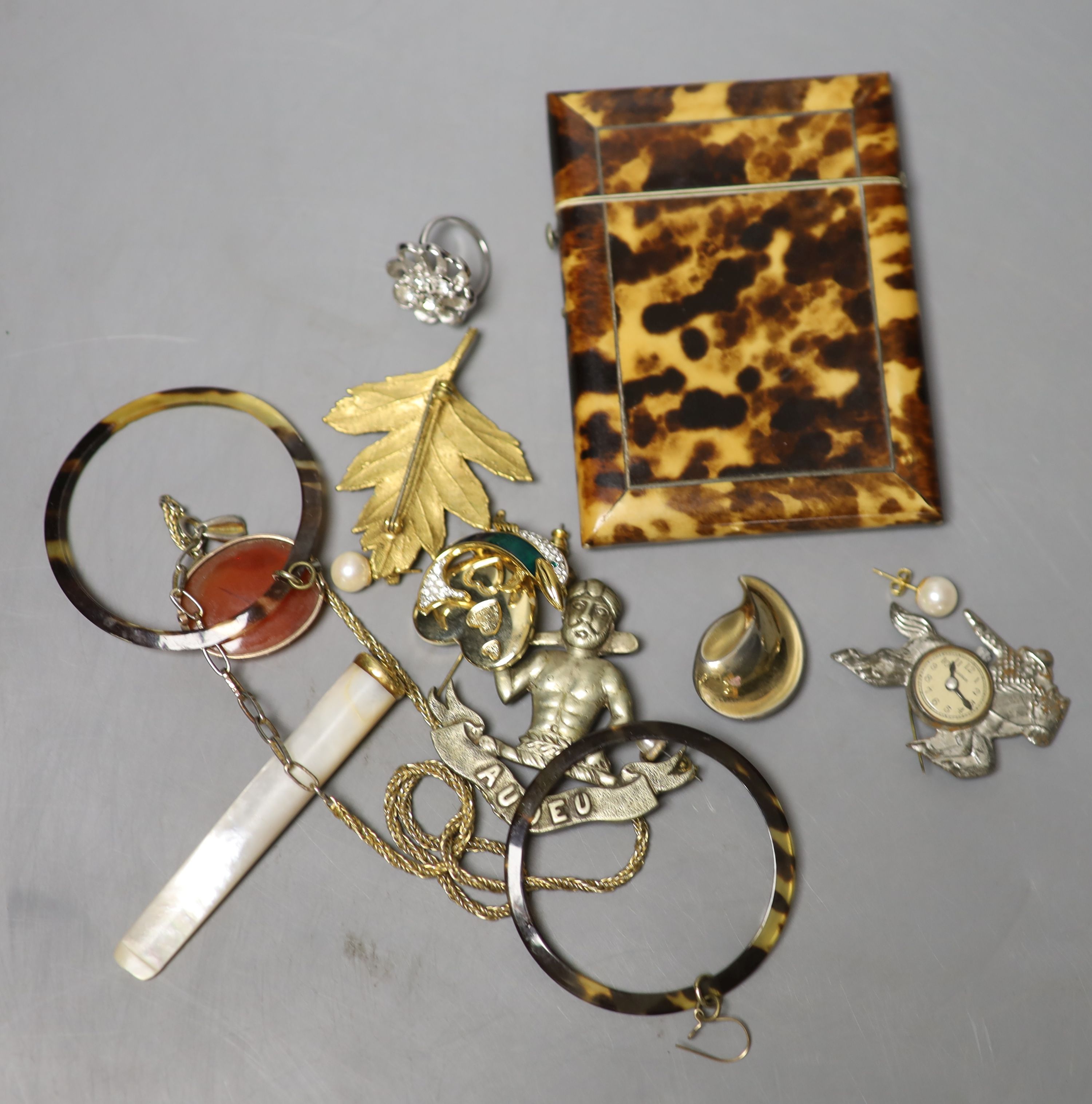 A 19th century tortoiseshell card case, 10.2cm, a pair of 14k and cultured pearl ear studs and a group of minor costume jewellery.